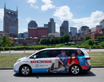 back2school van parked in front of downtown nashville backdrop