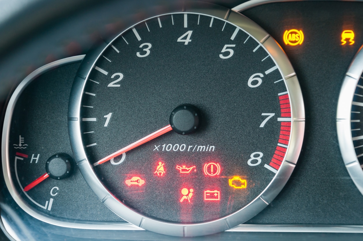 image of a car dash and tachometer