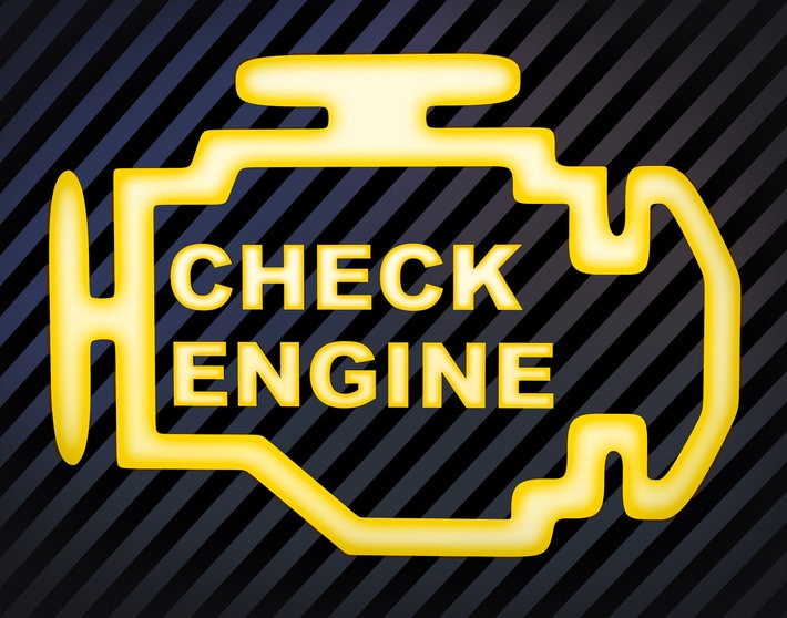 Yellow and black close up of car's check engine light on