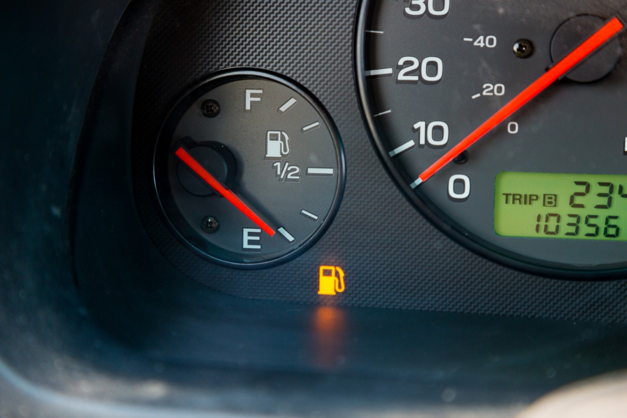 image of an gas gauge on empty
