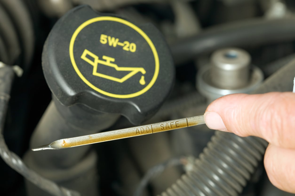 image of a dipstick measuring oil