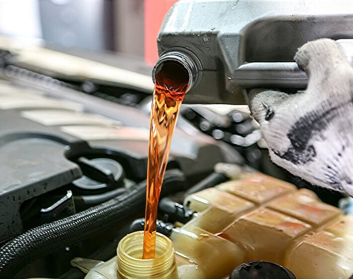 Want to defeat engine sludge? Start with regular oil changes!